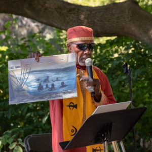 Berkshire NAACP president Dennis L. Powell, having carried water from the Housatonic River to Du Bois’s resting place in Accra, released water he collected from Last Bath River in Accra into the “golden river” where Du Bois was born nearby.