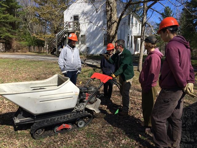 Peter provided instructions for safely operating the mechanical wheelbarrow.