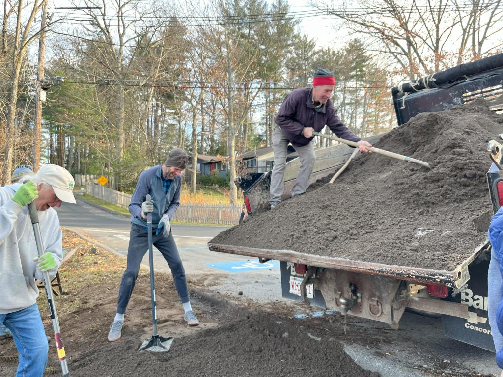 Then the fresh top soil was tamped  and ....