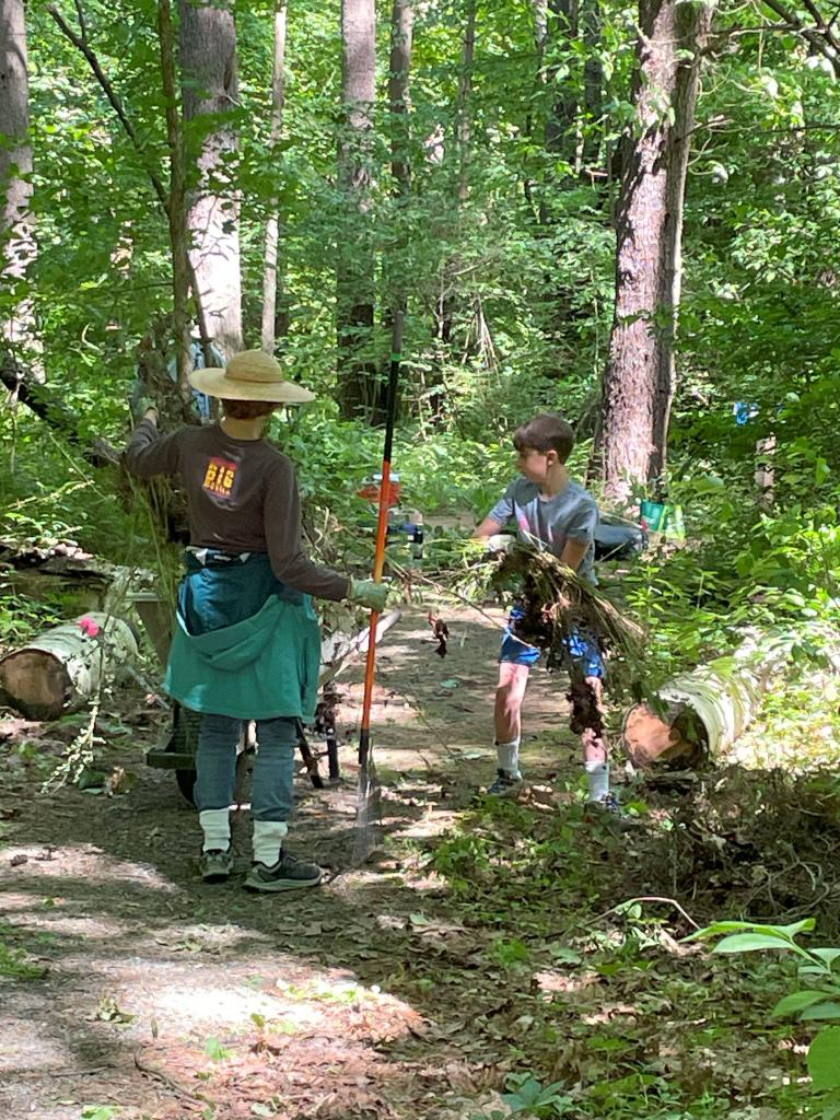 Teaming up to gather pulled plants helped us to work quickly and effeciently!