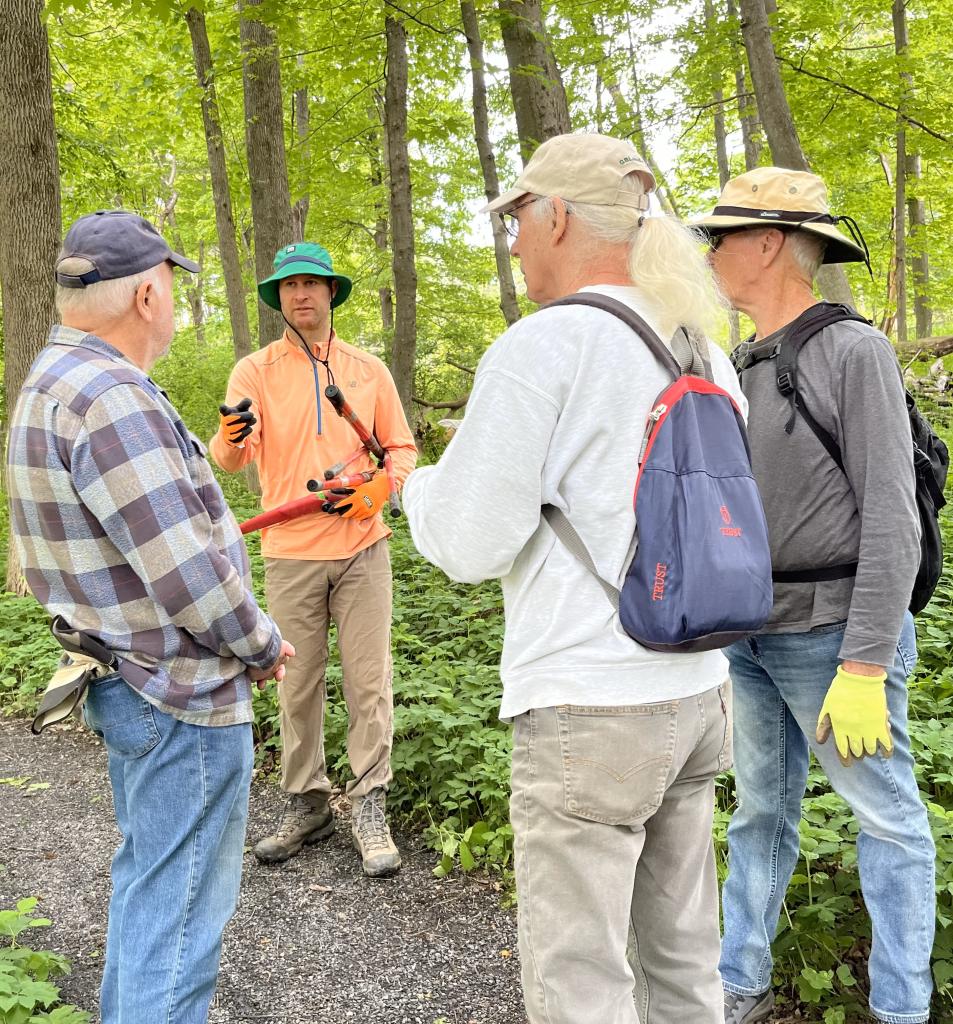 As the work party began, Brad Roblin, LM project leader, chatted with volunteers about the job possibilities.