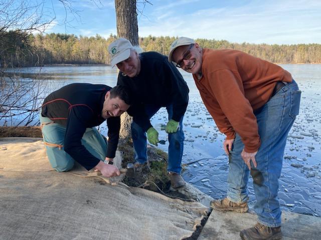 The final step was too secure erosion-preventing burlap in place ...