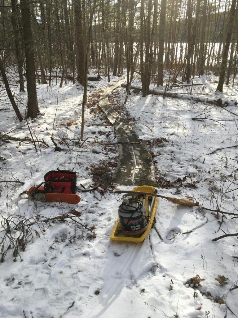The work area was swept and sleds were used to transport tools and materials in and out of the worksite
